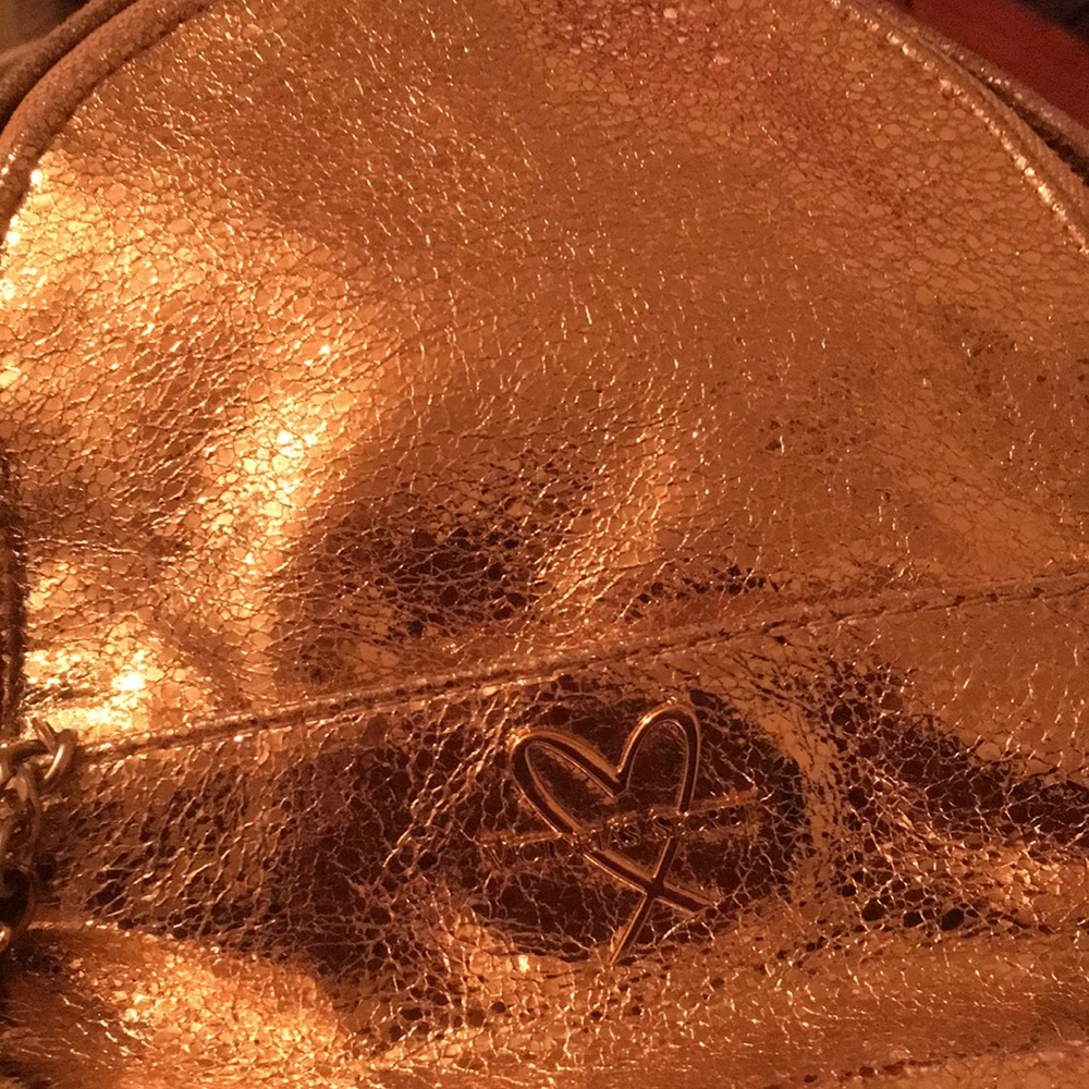 A Victoria’s Secret book bag purse